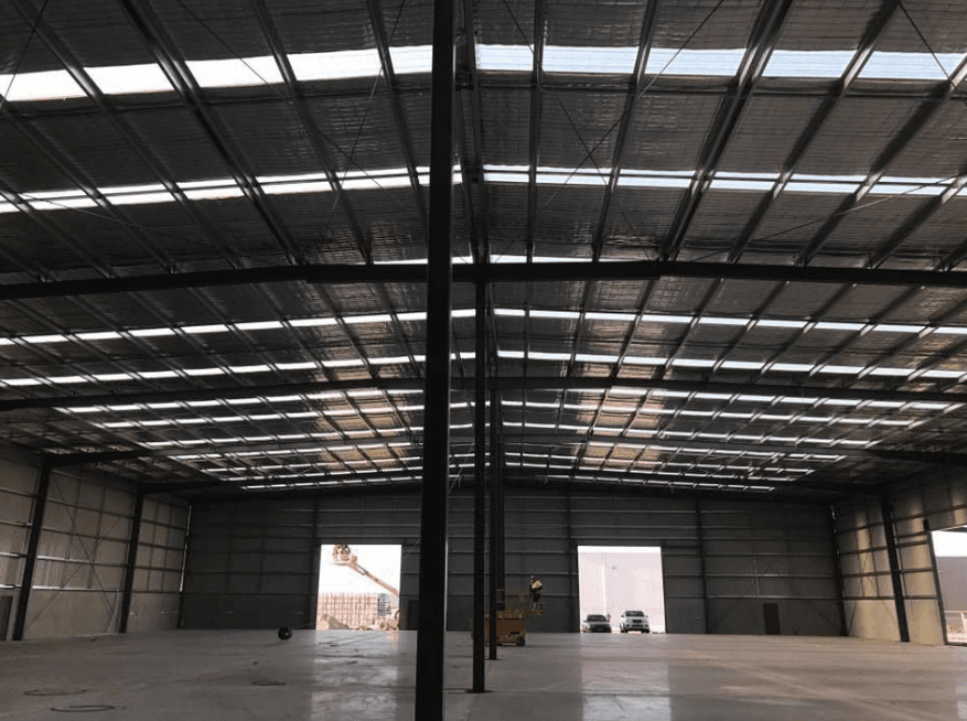 Interior of commercial warehouse with metal roofing system